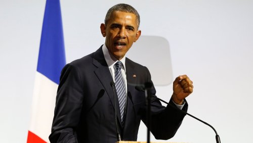 Obama urges climate deal as U.N. summit opens in tense Paris