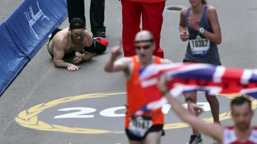 A Marine heroically crawled to the finish line of the Boston Marathon and it was awesome
