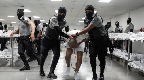 Shackles, shock troops, windowless cells: How bad is Trump's favorite Salvadoran prison?