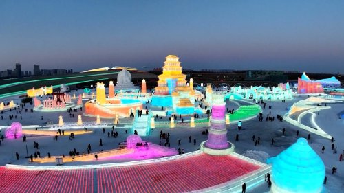 Harbin Ice and Snow World in China opens with more than 2000 sculptures, new ice slides