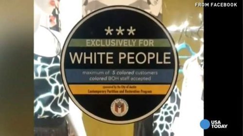 Whites only stickers posted on store windows