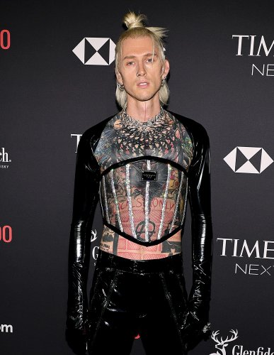Machine Gun Kelly Covered Up His Tattoos in Dramatic Fashion With Help of Renowned Visual Artist