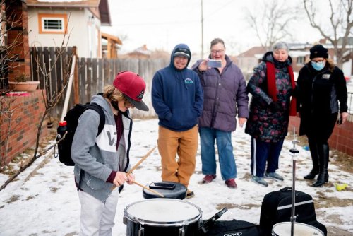 Newspaper Photo Leads Man to Donate Drums to Young Musician
