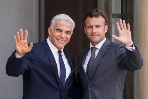 Israel's Lapid Meets Macron in Paris on First Trip as PM