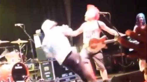 Watch Fat Mike of NOFX Deck This Fan in the Face