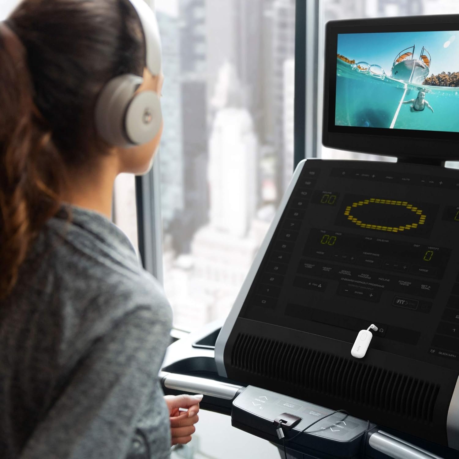 This Gadget Lets You Watch In-Flight Movies With Wireless Headphones (And It's On Sale)