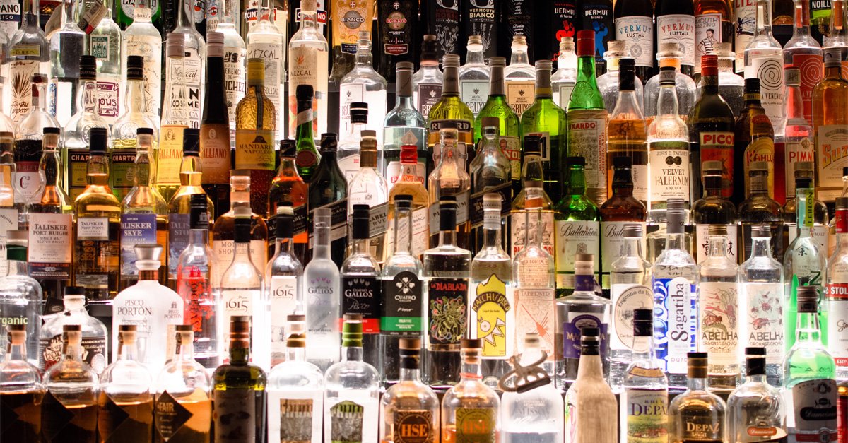 12 Bottles Every Home Bar Needs [Infographic]