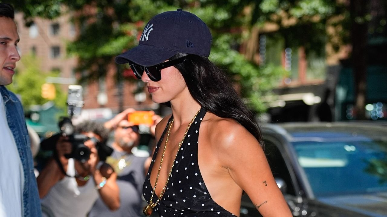 Dua Lipa Holds Onto Summer With An XL Polka Dot Manicure