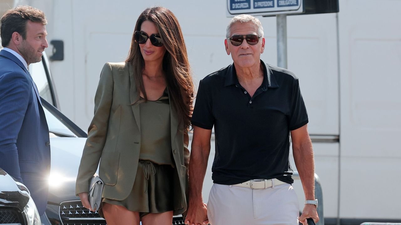 Amal Clooney Sails Into Venice In Satin Micro-Shorts
