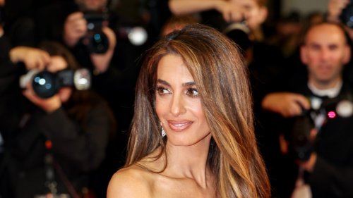 Amal Clooney Returns to the Red Carpet Solo, in a Cannes Dress Code-Breaking Gown