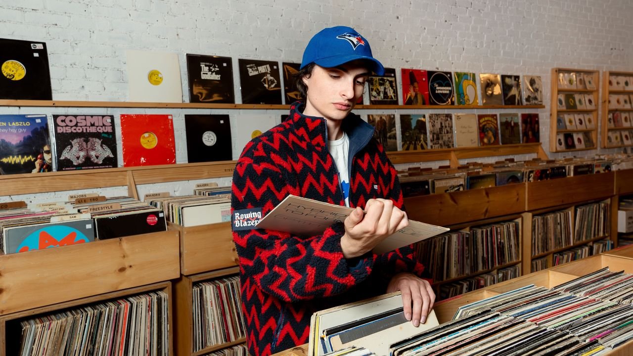 Ahead of His New Album, Finn Wolfhard Goes Record Shopping With Vogue