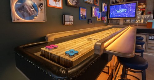 Slide Inside Chicago’s Cozy, High-Tech Shuffleboard Lounge