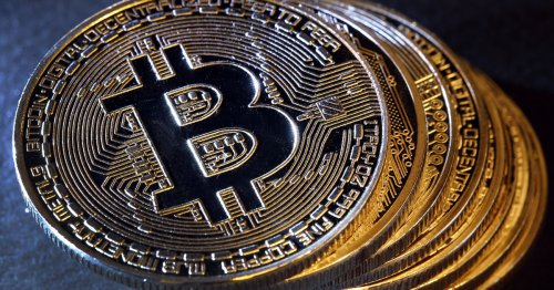 Bitcoin drops 50 percent from its peak value as it falls below $10,000