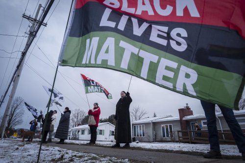 Community members protest Milton school board’s vote to take down Black Lives Matter flag - VTDigger