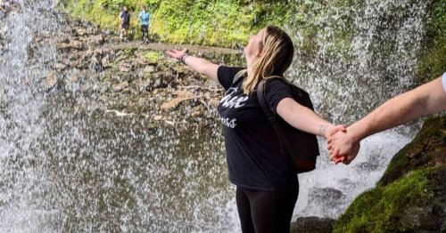 Lawyer who tried to claim £250,000 for 'disability' from car crash seen on waterfall hike while claiming she could barely walk