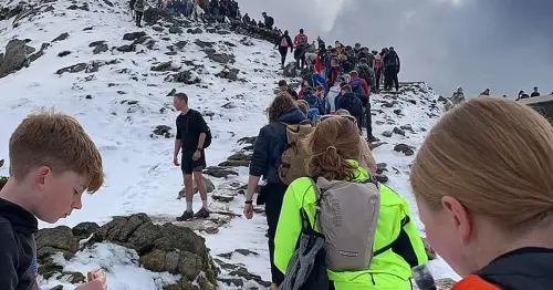 Yr Wyddfa tourists branded 'muppets' for climbing Wales' snow covered highest peak in trainers, flip flops and shorts