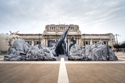 French street artist JR creates optical illusion at Milan Central Station