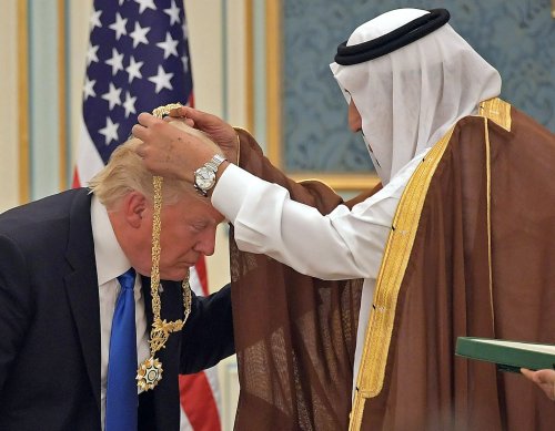 Trump signs ‘tremendous’ deals with Saudi Arabia on his first day overseas