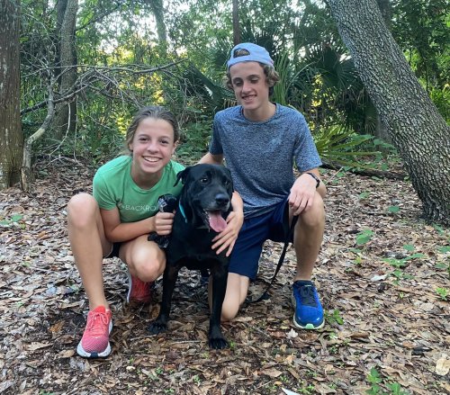 Seeking motivation, high school athletes run with shelter dogs