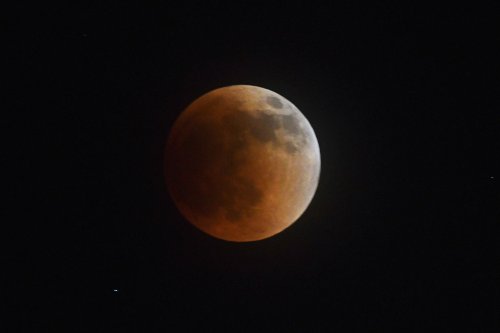 A blood moon lunar eclipse lights up the night sky - The Washington Post
