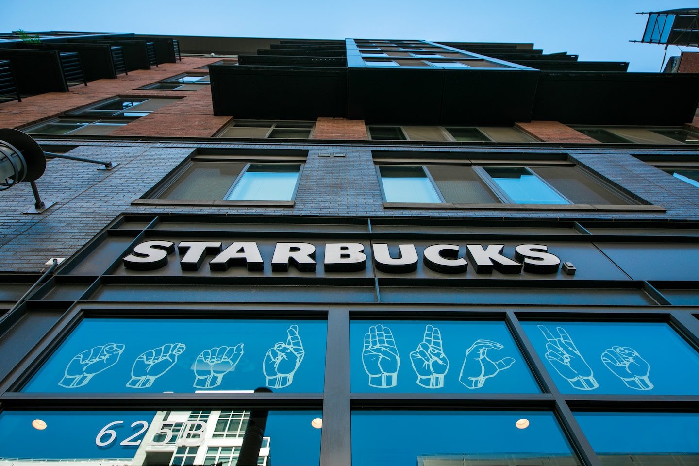 Starbucks opens first U.S. sign language store — with murals, tech pads and fingerspelling