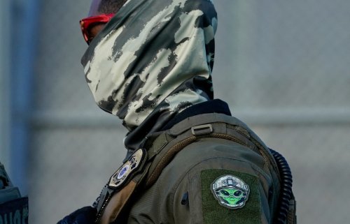 Opinion | Is that guy with a gun an ICE officer — or just a guy with a gun?