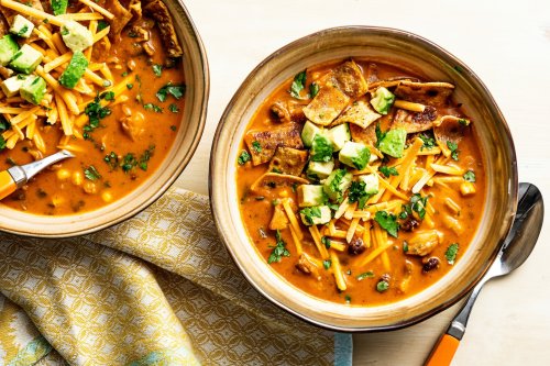 A vegan tortilla soup with mushrooms, black beans and all your favorite toppings