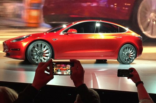 Tesla’s Model 3, its mass-market car, expected to roll off factory floor Friday