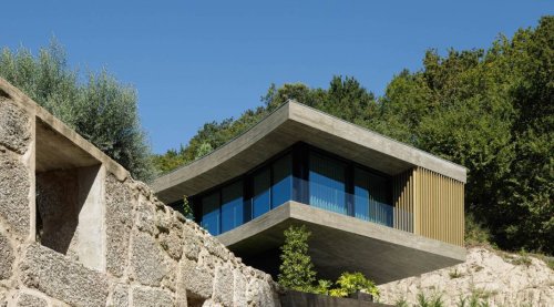 A Golden Curved House by Architecture & Design Studio Mutant