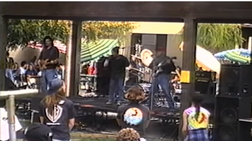 Watch: Rage Against the Machine's First Show Took Place At A School And People Lost Their Minds