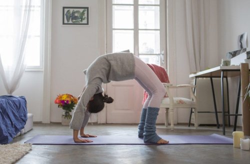 How to Master Your Full Wheel Pose—AKA the Queen of Heart Openers