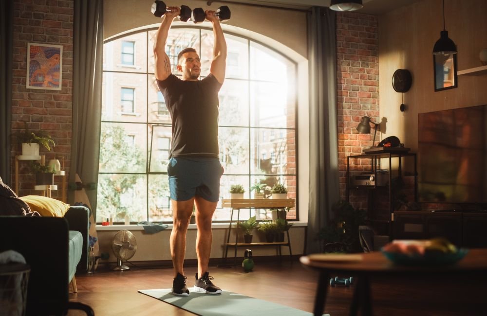 Build Muscle and Develop Full-Body Strength in 15 Minutes With This Five-Move Dumbbell Workout