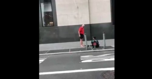 Jogger stopping to give homeless man shoes off his own feet captured on video