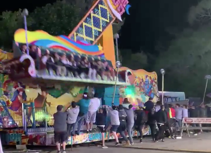 VIDEO: A Group Of Spectators Held Down A Carnival Ride Full Of People To Keep It From Tipping Over