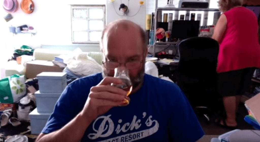 Guy Reviews Scotch While His Wife Packs Her Sh*t To Divorce Him In The Background