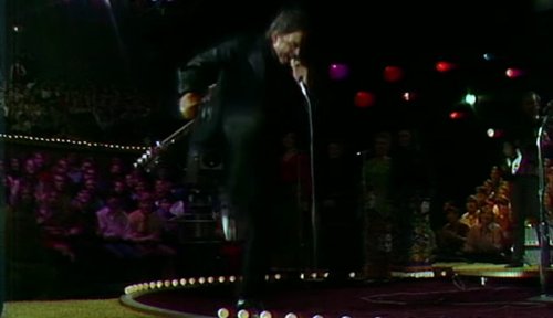 Watch Johnny Cash Stomp The Footlights At The Ryman Auditorium In A Nod To The Time He Was Banned From The Grand Ole Opry