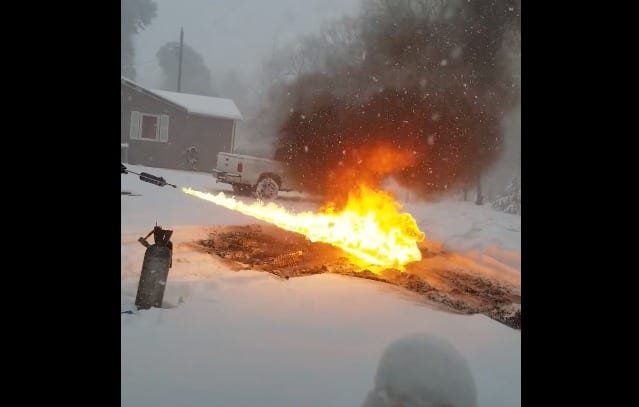 Redneck Genius Removes Snow From Driveway With Flamethrower