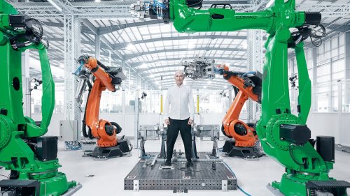 To make a new kind of electric vehicle, first reinvent the factory