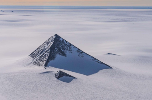 Mysterious pyramid discovered peaking up through the white landscape of Antarctica