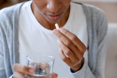 The best way to take a pill, according to science