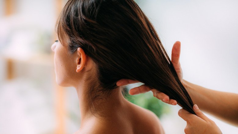 Traditional Hair Oiling Is More Than Just A Treatment – It's A Deeply Personal Self-Care Practice