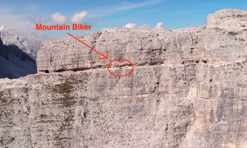 Hikers Are Usually Harnessed Here...This Mountain Biker Clearly Isn't
