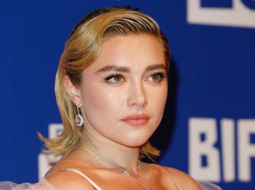 Florence Pugh Embraces Dramatic Glamour at BIFA 2022 in Rodarte Lace Slip Dress and Dramatic Tulle Cape