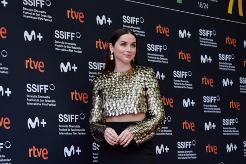 Ana de Armas Gleams in Gold Metallic Louis Vuitton Cropped Top and Skirt for ‘Blonde’ Premiere at San Sebastián Film Festival