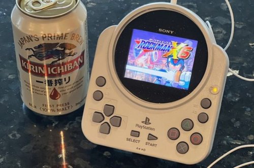 Rare 2001 PS1 controller modded into a quirky PlayStation handheld emulator