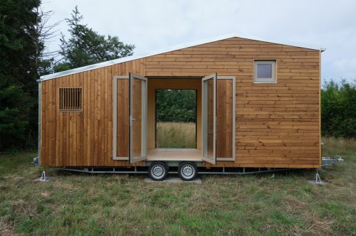 This Scandinavian tiny home on wheels comes with off-grid features for an eco-friendly escape to nature!