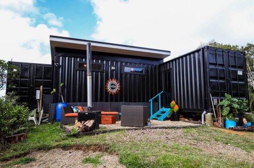 With eco-insulation and solar power, this tiny home built from five shipping containers was designed for off-grid living!