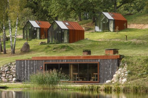 Corten Steel & Glass Cabins Make Up A Wonderful Wellness Resort In Latvia