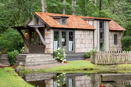 This low-country tiny cottage embraces rustic minimalism for the ideal winter escape in the marshlands!