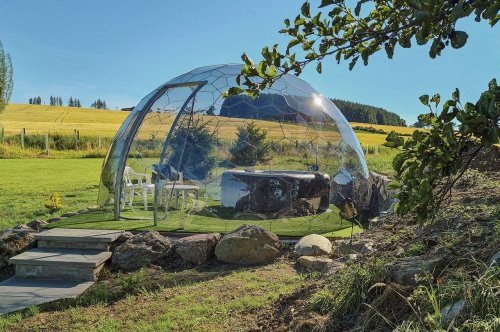 Futuristic-looking garden dome functions as an office space, yoga den, and nap spot to sleep under the stars